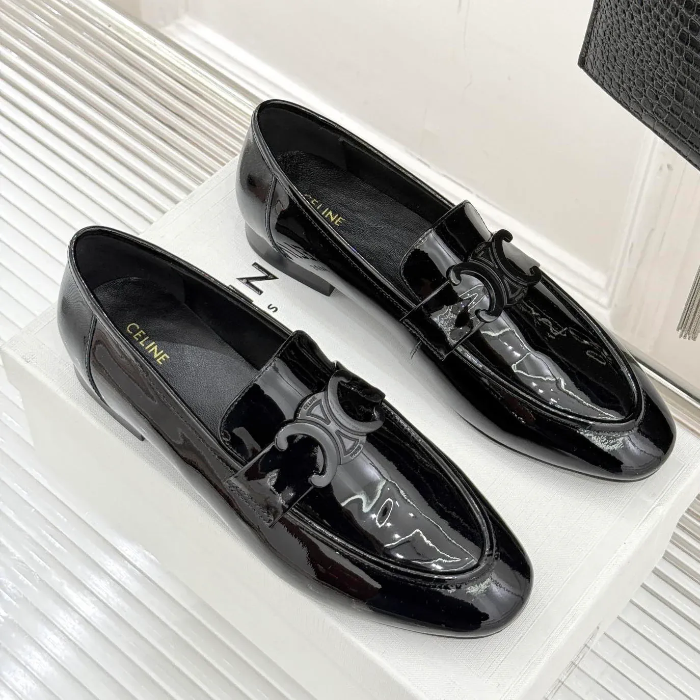 Classic Triumph Buckle Loafers