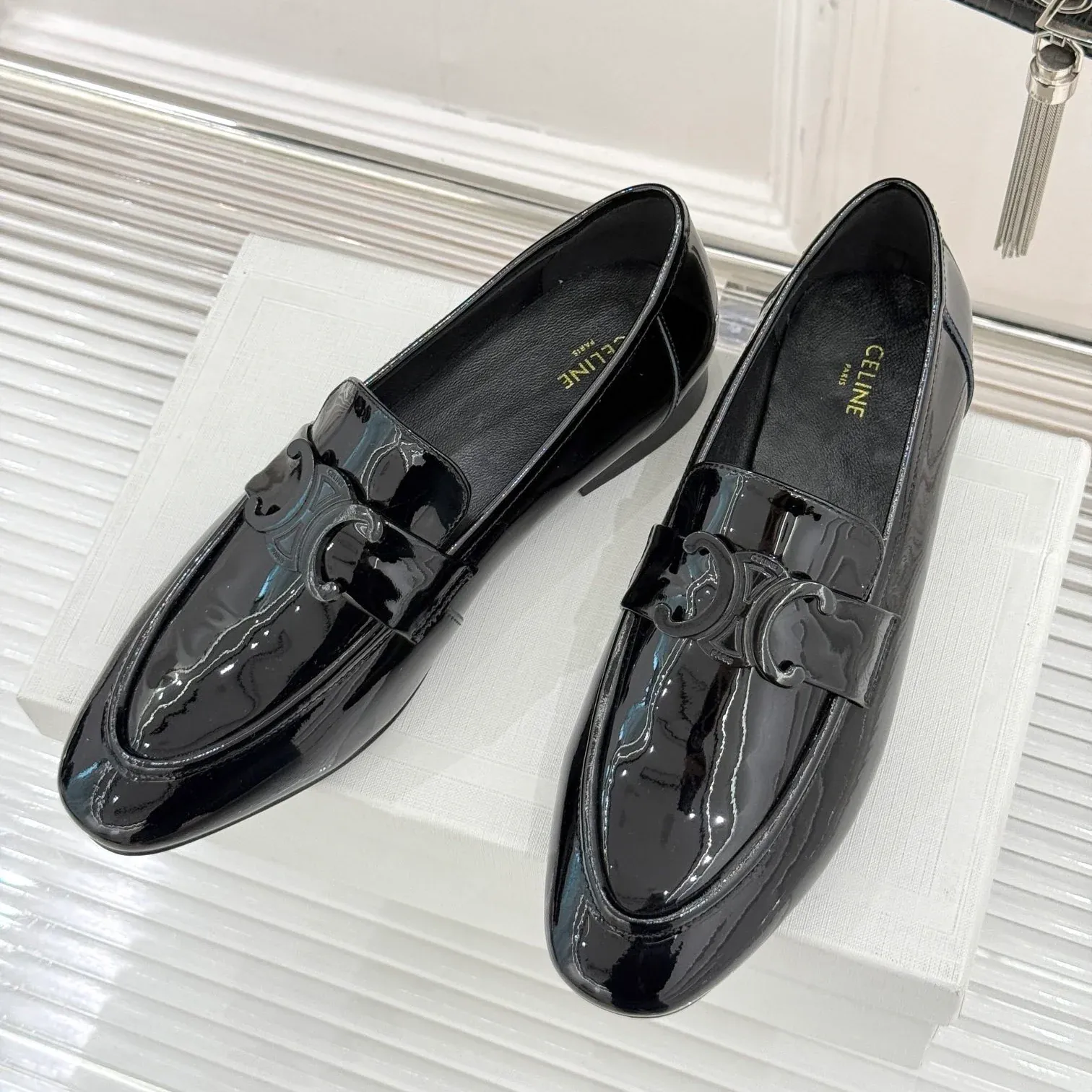 Classic Triumph Buckle Loafers