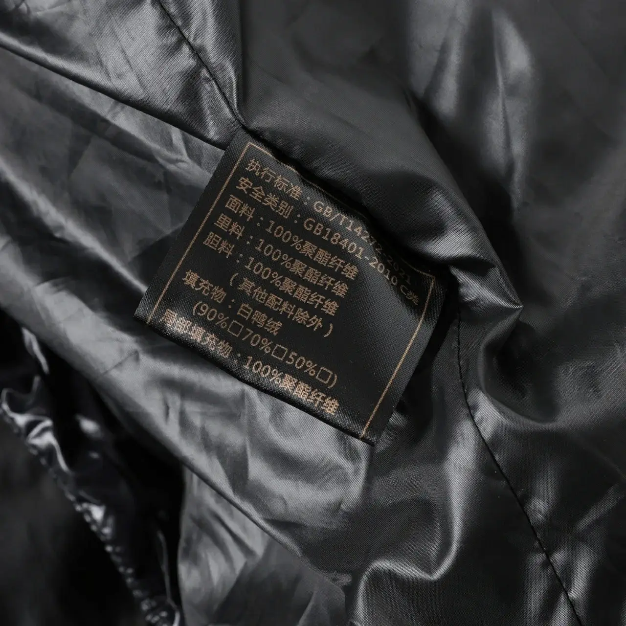 Black gold mid-length hooded down jacket