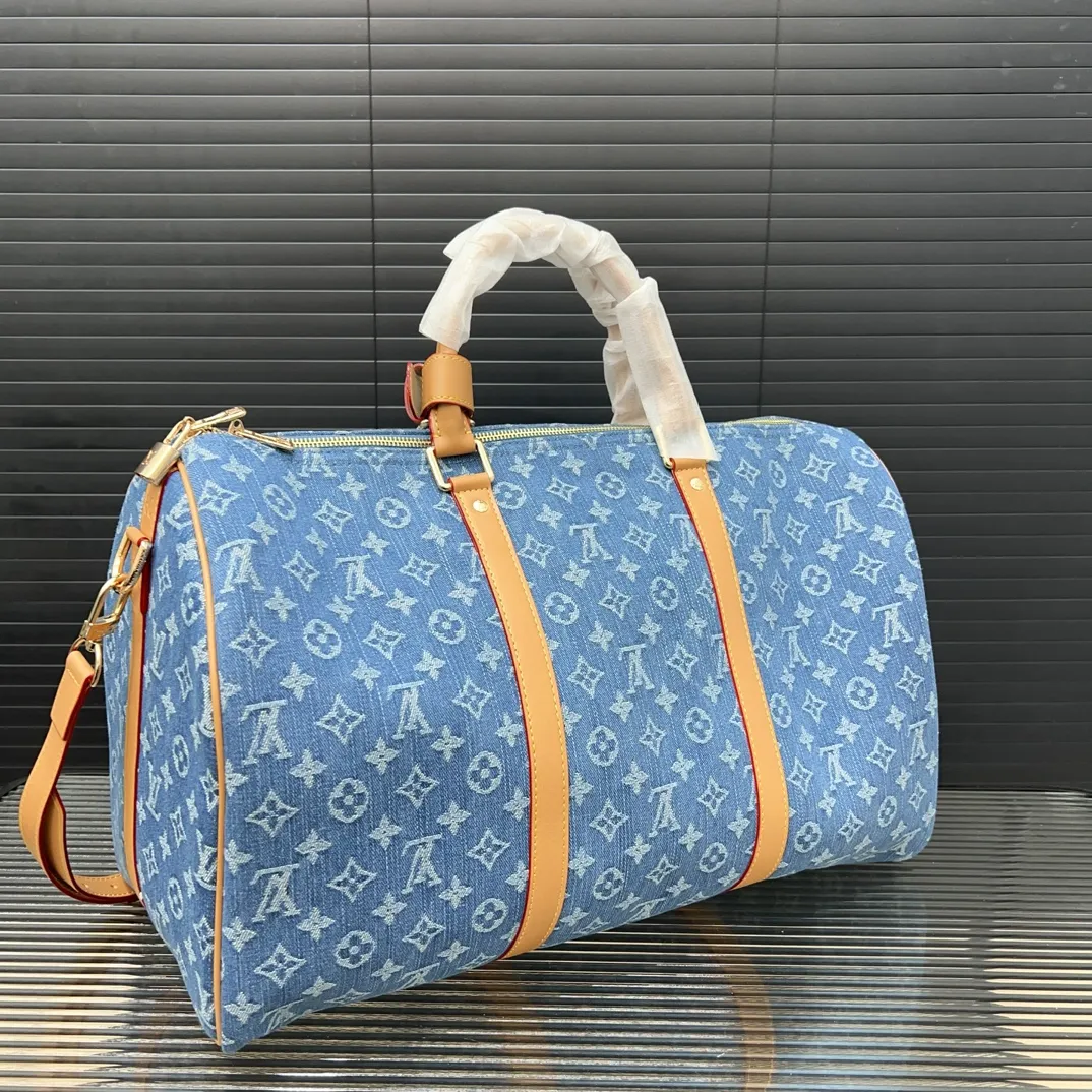 New Denim Co-branded keepall crossbody travel bag
