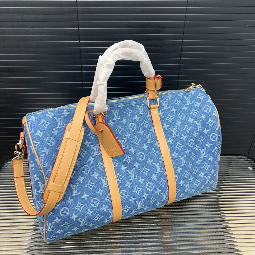 New Denim Co-branded keepall crossbody travel bag